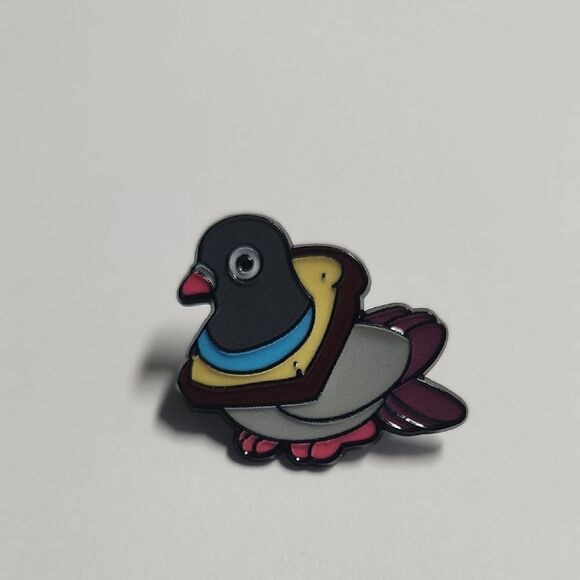 Colorful Bird Pin Head In Piece Of Bread - Picture 1 of 2